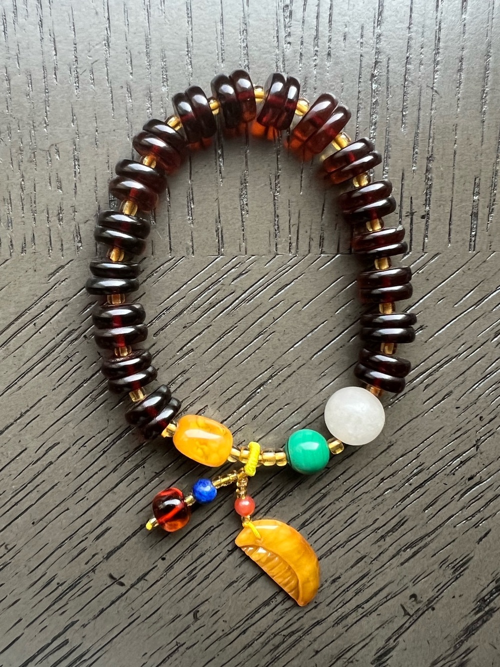 Blood Amber donut bracelet with charm 9mm SIZE 6.5’